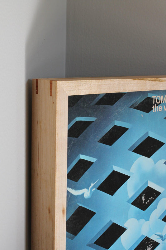 Close-up of a maple album frame corner with miter spline, holding The Who's Tommy