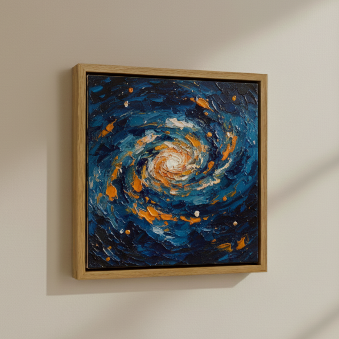 White oak floating canvas frame holding a blue and gold abstract painting, angled view