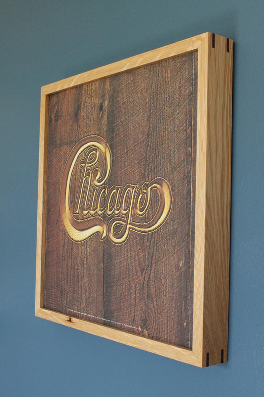 White oak album frame with walnut miter splines holding a Chicago record sleeve