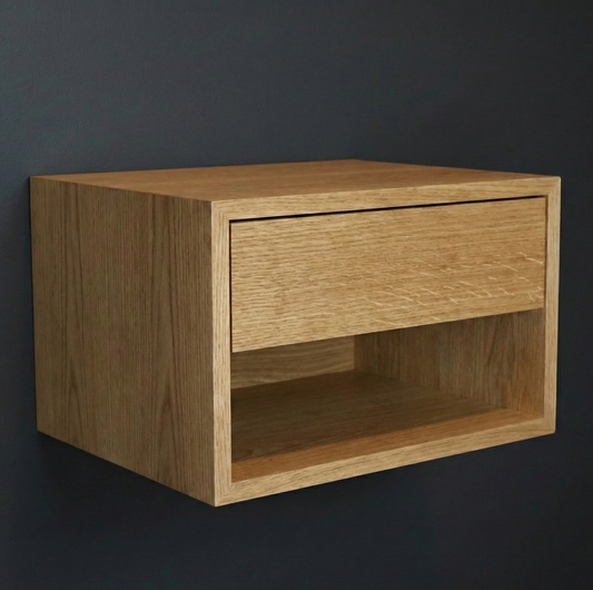 Wooden nightstand with a drawer on a dark background