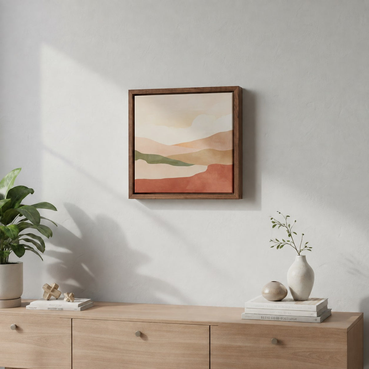 Walnut canvas floating frame on a wall above a sideboard