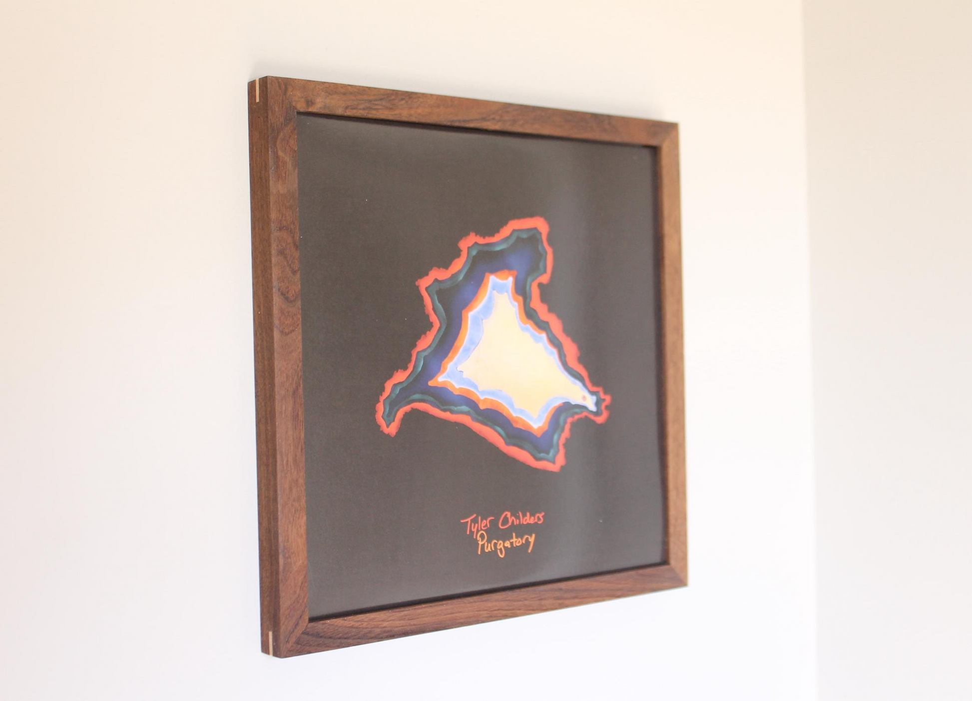 a picture hanging on the wall of a room