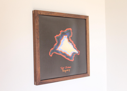 a picture hanging on the wall of a room